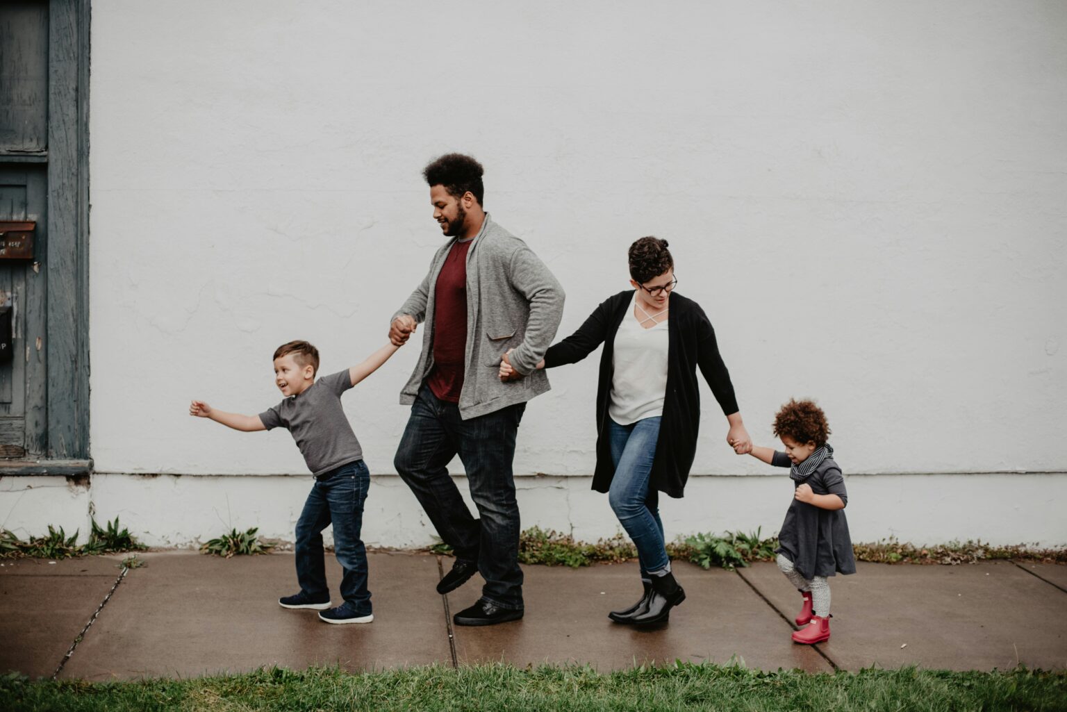 Happy family walking together, an established family moving forward with stability